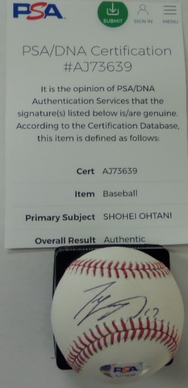 This Official Major League Baseball from Rawlings is cubed in NM/MT condition, and comes hand-signed on the sweet spot in black ink by reigning AL MVP, Shohei Ohtani.  The signature grades an overall, legible 7, and comes PSA/DNA certified (AJ73639) for authenticity.  Valued into the high hundreds!