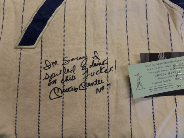 This vintage Majestic Cooperstown Collection jersey is circa 1970's and has his #7 sewn on back. It comes not only hand signed in bold black sharpie, and with the original show ticket from Hofstra, but has a curse word laden inscription written in his HOF hand as well. Very funny, quite unique, and a must have for all Yankees/Mantle and HOF faithful.