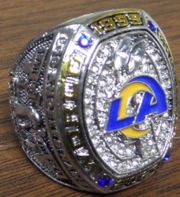 This absolute Stunner Ring is Heavy and just in from the manufacturer and is an exact replica of the 2021 Super Bowl Champion LA RAMS and their star QB “ Mathew Stafford”.  The top has 1999–2021 “WORLD CHAMPIONS” with the LA logo in Rams colors over the two Lombardi trophies.  One side has Los Angeles Rams across top with score “LAR 23 and “CINC 20” and Super bowl 2021 with trophy engraving.  The other side has “ STAFFORD” and his #9 with QB and his helmet and “ Return of the King” engraved. Truly a heavy well made Gorgeous ring for any Rams or NFL fan.  This ring even has the NFL logo and SUPERBOWL engraved on the inside of the ring.