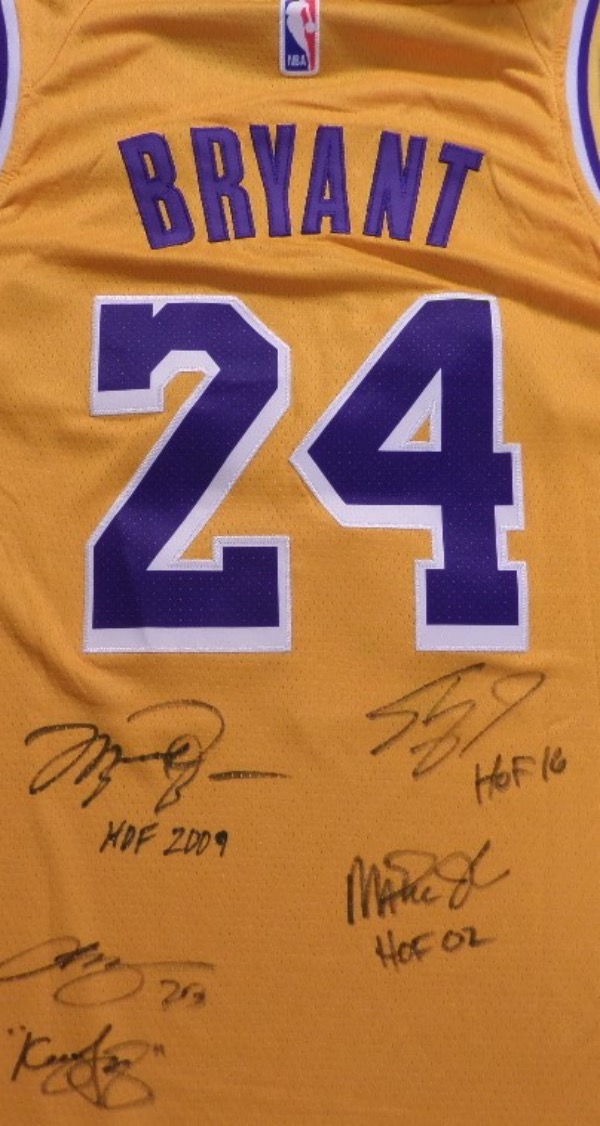 This yellow size 50 Bryant #24 Los Angeles Lakers jersey is from Nike and still has its original tagging affixed.  It is back-signed in black sharpie by 4 of the greatest players in league history, including LeBron James, Magic Johnson, Shaq O'Neal and Michael Jordan, and each player has added an inscription to boot.  Awesome NBA item, and retail is well into the thousands!