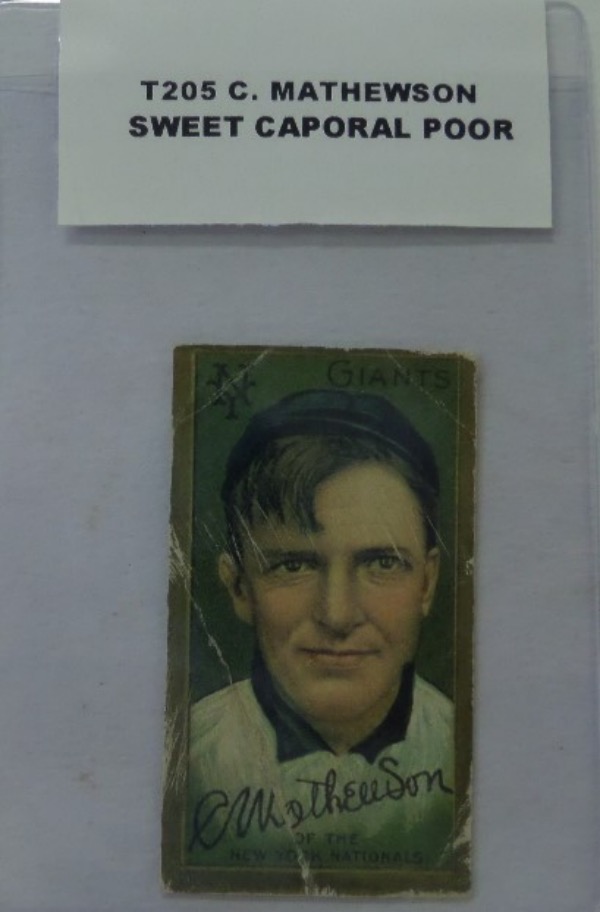 This 1911 Gold Border T205 Baseball card is the Christy Mathewson Card in POOR condition, with some creasing, but nothing Major. The back is clean and overall a decent looking baseball card from 1911. The value of this beauty is $600+ and a great addition to any vintage baseball card collection.