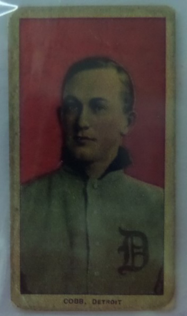 This card is in G shape overall and well over 100 years old! It has the red background and shows a young Ty in uniform with no cap on.  Tough to find in any variation and valued into the low thousands. 