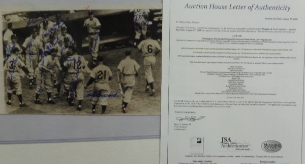 This black and white wire photo measures 6.25x9.75, and is an image of members of the NL pennant-winning 1950 Phils congratulating teammate Bill Nicholson on a three run home run.  It is hand-signed in blue sharpie by Nicholson and 15 of his "Whiz Kids" teammates, including Del Ennis, Russ Meyer, Robin Roberts, Andy Seminick, Dick Sisler, Putsy Caballero, Curt Simmons, Granny Hamner, Mike Goliat and more, and a copy of the original JSA group LOA is included for authenticity.  A one of a kind Phillies item, and a MUST for any fan of this beloved team!