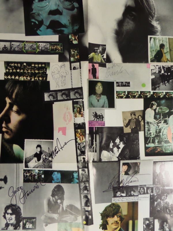 This roughly 22x33 poster is the foldout from the original "The Beatles" 1968 album, better known to the public as "The White Album."  It is hand-signed by all four Beatles, including John in black ink, and Paul, George and Ringo, all in black sharpie.  A MUST for framing and display, and retail is well into the thousands!