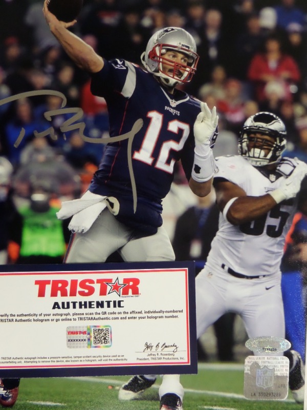 This fully, no-nonsense Tr-Star piece is a silver paint pen signed color 8x10 of the GOAT. It grades a 10, has 2 LOA's and the added hologram for certainty, and value is two grand on the ultimate Super Bowl Champion. 