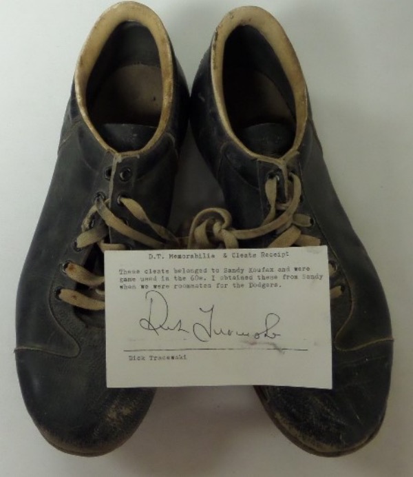 This museum worthy lot is a well used pair of black metal spikes and were worn by the icon during the 1960's for his LA Dodgers. A hand signed Dick Tracewski note accompanies, fully PSA/DNA certified and hologrammed, and value might be thousands on the impossible game used item from the aging fast HOF hurler. 