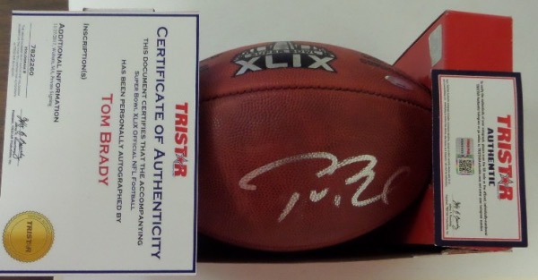 This amazing and MUST have item is a Wilson "The Duke" authentic style Super Bowl XLIX logo all leather football, still boxed in store-bought condition.  It is hand-signed in bright silver by the man who has won more Super Bowls than any other, future Patriots/Buccaneers HOF QB, Tom Brady!  The signature is a big, bold 8.5-9 overall, and the ball comes fully TRISTAR certified (782260) for rock solid authenticity.  With Brady very likely entering his final season, retail on this collector's JEWEL is low thousands, to be certain ... but look at that minimum bid!  We must be insane!!!