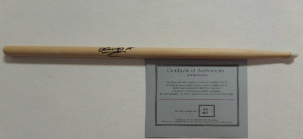 This NM/MT wooden drum stick measures 16" in length and is hand-signed in black sharpie by one of the most famous percussionists in rock and roll history, Beatles "beat man," Ringo Starr.  The signature reads Ringo, with a hand-drawn star next to it, grades an overall 8, and the stick comes fully certified by JLA Authentics for authenticity.  Valued well into the hundreds!