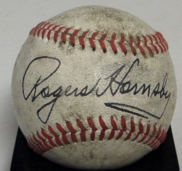 This red-laced, vintage baseball is unmarked and in G+ condition overall.  It has been hand-signed against the sweet spot in black fountain pen ink by the two time Triple Crown winner himself, grading an overall 7.5, and this ball is valued into the thousands!