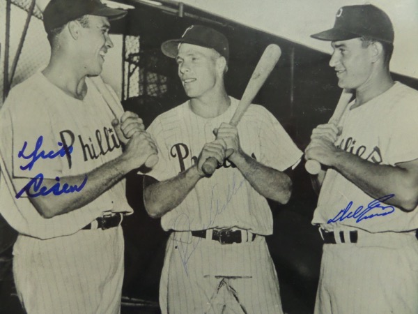 This AWESOME Philadelphia Phillies collector's item is a black and white 8x10 photo, showing the starting outfield from the pennant-winning 1950 Phillies "Whiz Kids" squad.  It is hand-signed by all three, including 3 time NL All Star, Del Ennis, Pennant-winning home run hitter Dick Sisler, and HOF great Richie Ashburn, and the photo includes a copy of an original JSA group LOA.  With all three men long gone, retail is well into the hundreds!