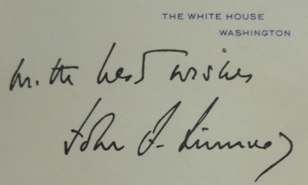 This vintage white card measures 2.5x3.75 in size, with The White House, Washington in type set on the top left hand corner.  It is hand-signed in black flair marker by former President Kennedy, his signature grading a super 8.5, with With Best Wishes added in his hand.  There are certainly a number of applications for this piece, not the least of which is that it is an ideal size for a bookplate, but you listen to your heart, and bid big, because this baby is simply stunning!