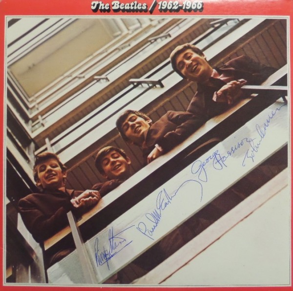 This Lee approved LP is "The Beatles 1962-1966" and shows all 4 rock stars on the color cover. Condition of the LP is about fine+, and all 4 have signed great spots in bold blue ink. The 4 high value signatures are all honest 9's or better, and value of it all is thousands. Solid musical investment, and just look at the always low asking price. 