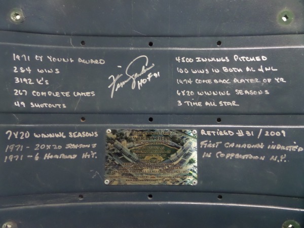 This super cool Cubs piece is a rare one of a kind, and an actual seat from inside the fabled Chicago Stadium. It is a blue plastic seat back, comes not only silver paint pen signed by the HOF pitcher in silver, but with a ton of career stats written as a bonus as well. An authenticity plaque is adhered as well from "Stadium Seats" and value is super high on this fabulous display item. 