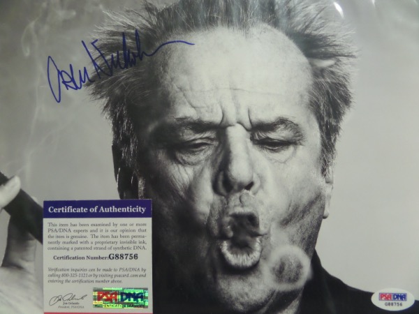 This black and white 8x11 photo is a close up of the iconic image of Jack blowing smoke from a cigar.  It is hand-signed in blue sharpie by the 3 time Academy Award winning actor himself, with the signature grading a strong 8.5-9, and the photo comes with a COA from PSA/DNA (G88756) for absolute authenticity.  Valued into the mid/high hundreds!