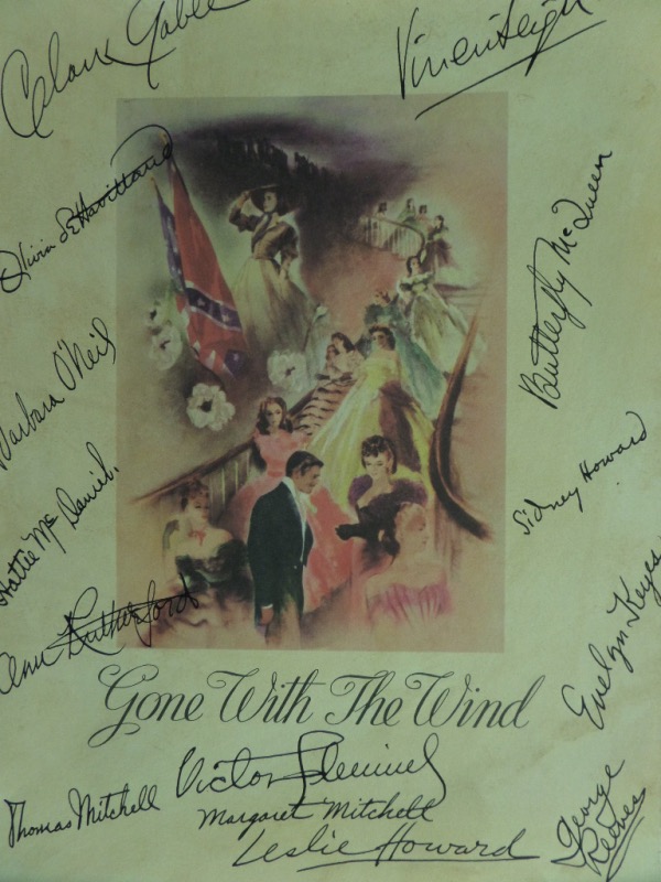 This amazing piece of film lore is an original 1939 full program for that year's Academy Award winner, "Gone with the Wind."  It is completely intact, in EX overall condition, and comes front cover-signed in black fountain pen ink by 14 people responsible for its creation.  Included are Margaret Mitchell, Victor Fleming, Clark Gable, Thomas Mitchell, Hattie McDaniel, Leslie Howard, Butterfly McQueen, Vivien Leigh, Ann Rutherford, George Reeves, Olivia de Haviland and more.  A simply stunning collector's item, and with so many deceased silver screen legends on here, retail is well into the low thousands!