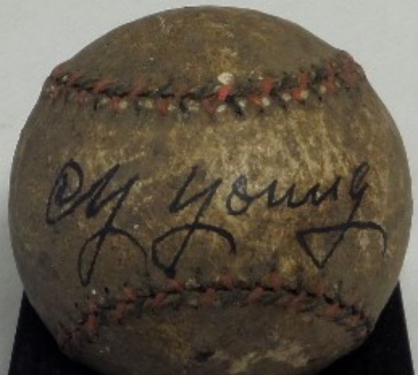 This vintage red and blue-laced and unlabeled baseball is in F overall condition, and is black ink-signed across the sweet spot by the winningest pitcher in MLB history, 1937 HOF Inductee, Cy Young!  Signature here is about a 6.5, and retail is easily low thousands!
