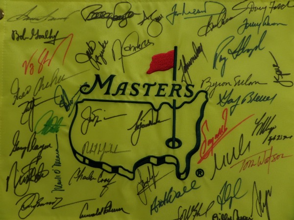 This NM/MT yellow Masters logo pin flag is a MINT, authentic style flag that is hand-signed by no less than 40 champions of the Augusta International major tournament.  Included are Nicklaus, Player, Palmer, Faldo, Floyd, Nelson, Snead, Watson, Langer, Cabrera, Singh, Woods, Mickelson, Ford, Goalby, O'Meara, Weir, Casper, Scott, Immelman, Zoeller and more.  Just an incredible PGA collector's item, and the retail value here is into the stratosphere!
