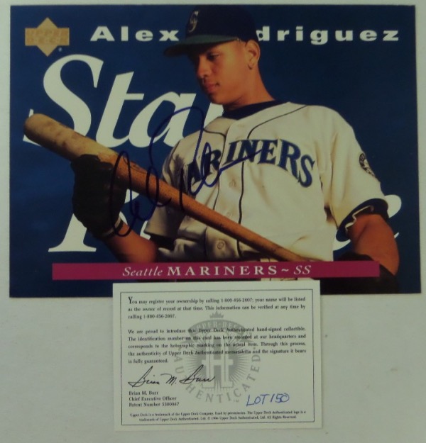 This 1995 Upper Deck #215 Alex Rodriguez Star Rookie card is large, measuring about 5x7, and comes hand-signed in blue sharpie by the 696 HR star himself.  The signature grades a strong 8.5 overall, and the card comes with both a COA and hologram from Upper Deck (AAE19567) for absolute authenticity.  Valued well into the mid/high hundreds!
