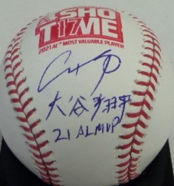 This Angels "ShoT17me" logo baseball is in NM/MT condition, and comes side panel-signed in blue ink by the AL MVP himself, pitcher/outfielder, Shohei Ohtani.  Signature here is an 8.5 at least, in both English and Japanese, including a 21 AL MVP inscription, and the ball is valued well into the hundreds!