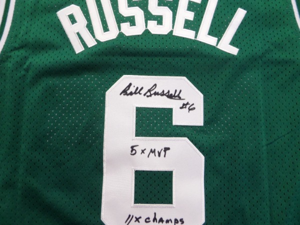 This RARE collector's item is a green size 44 Boston Celtics 1962-63 throwback jersey from Mitchell & Ness, still NEW with original tagging, and trimmed in white, with everything sewn.  It is back number-signed by the most successful team sport player EVER, grading a legible 8 in black sharpie, with #6, 5X MVP and 11X Champs inscriptions.  With the all time great's recent passing, retail on his already valuable signed items has TRIPLED!!!!