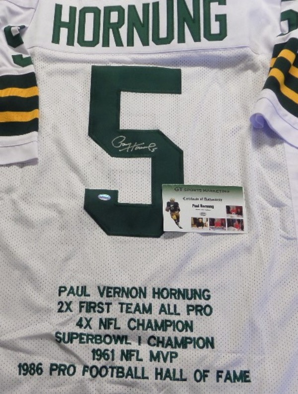 This MINT condition, white GB Packers jersey is trimmed in yellow and green with everything nicely hand stitched, including 6 lines of embroidered stats and career accomplishments below the back number, making it ideal for display.  It comes back number signed in silver sharpie by the great "Golden Boy" himself, and is fully GTSM certified for unquestioned authenticity!  A wonderful piece of NFL HOF lore!!!