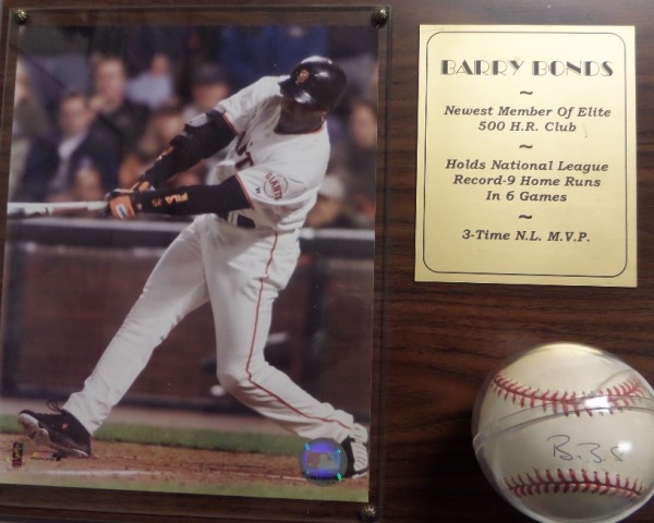 This superb, custom plaque is certified by Stacks of Plaques and holds a single-signed, Nm. Off. NL ball from th toughie. It is sweet spot signed in ink, rests in a lucite holder, and on a 12x15 real wood photo-plaque. A custom engraved placard is attached to the professional job, and value is mid-hundreds on the impossible record holder. 