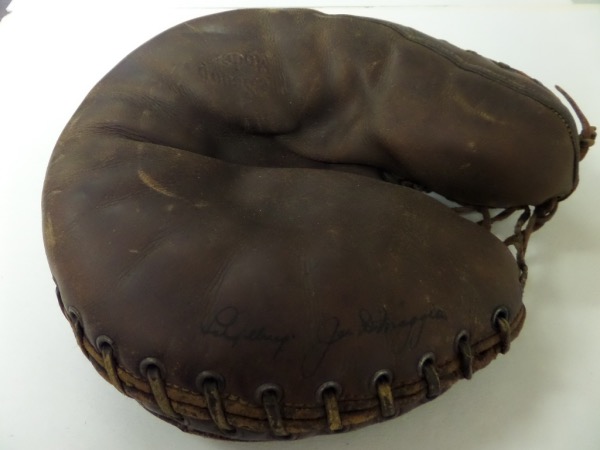 This vintage, well used and oiled catchers mitt lays flat, and comes black ink signed by both late, great NYY HOF Legends. The glove itself is fine, no damage or abuse, and both signatures can be read and seen from 4 feet away rather easily. Cool piece, certainly a HOF worthy one of a kind, and value is ?