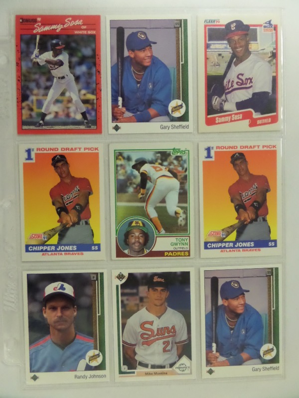 This outstanding card collector's/dealer's chance is NINE rookie baseball cards of superstar/HOF players, each in a very high grade. Please see our attached photo to check out these sharp cards, and included are a 1983 Topps #482 Tony Gwynn, (2) 1991 Score #671 Chipper Jones, (2) 1989 UD #13 Gary Sheffield, a 1989 UD #25 Randy Johnson, a 1991 UD #65 Mike Mussina, a 1990 Donruss #489 Sammy Sosa, and a 1990 Fleer #548 Sammy Sosa.  These cards are all in high grade--each a NM or better, and retail is sky high on the lot of NINE together!