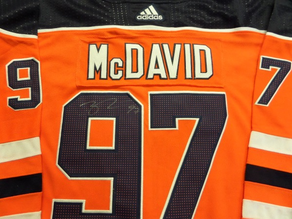This mint orange authentic Edmonton Oilers jersey has embroidered everything. It comes signed on the back numbers wonderfully by this top draft pick and young megastar and best player in the game with his #97 included. Retail is already into the low thousands from this stud and  rising as they could win it all!
