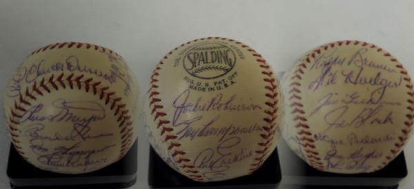 This amazing attic find is a Warren Giles Official Spalding NL ball and comes ink signed by the 55 World Champs nicely. I see signatures from Campanella, Jackie Robinson, Gil Hodges, Pee Wee Reese, Shotgun Shuba, Duke, Snider, Johnny Podres, Joe Black and many, many more of your Brookln Faves. It grades a clean strong and legible 7, and value is thousands. Dressen on sweet spot and he left after the World Series in 53.  