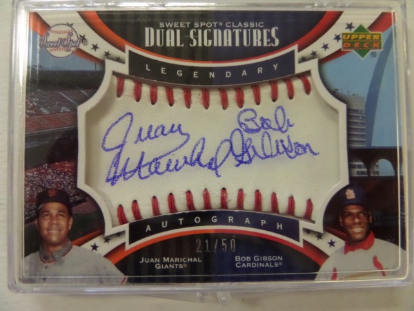 This 2007 Sweet Spot Classic Dual Signatures baseball card from Upper Deck is in NM/MT condition, and comes numbered 21 out of only 50 done!  This card features a section from a baseball, autographed by BOTH Bob Gibson and Juan Marichal, and is completely Upper Deck guaranteed!  AWESOME and super RARE MLB collector's item, valued into the high hundreds!