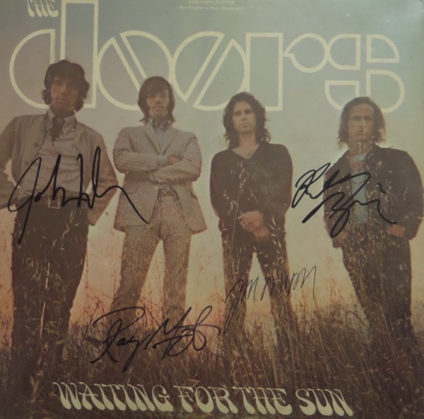 This vintage LP is in great shape, titled "Waiting for the Sun"", and shows all 4 band mates on the color cover. It comes boldly black marker signed by all 4, grade is a clean bold 10 all over, and of course Jim Morrison is here. High value, but sold here with NO reserve! It is the jacket ONLY, there is NO record inside!