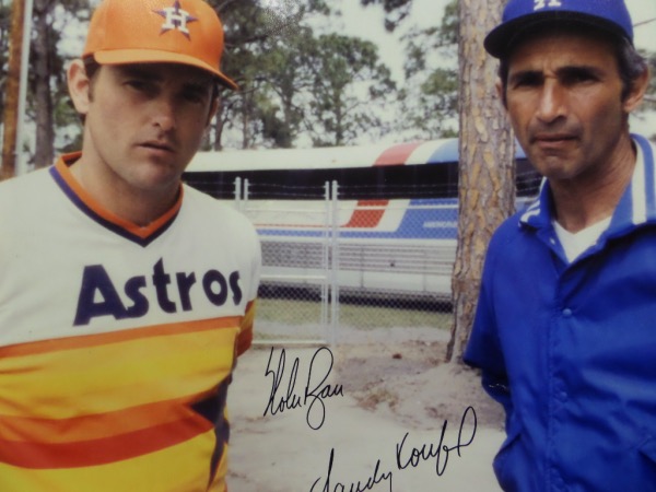 This giant 16x20 color image was taken by an amateur after a Dodgers/Astros Spring Training game in the 1980's, then signed by BOTH HOF Hurlers in bold black sharpie at a later date. It is a clean bold 10 all over, shows off well from 35 feet away, and value in the super-size is upper hundreds. Ryan is tough, Koufax is nearly impossible. 