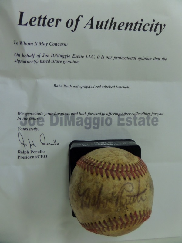 This incredibly old, well-worn baseball is laced in red, with no discernible manufacturer's labels or markings, and is in P+/F overall condition.  It is hand-signed against the sweet spot in black fountain pen ink by The Bambino himself, grading a light but legible 5.5, and is fully Joe DiMaggio Estate certified for your assurance.  Valued at $10,000 all day long!