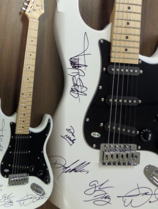 Wow, this mint white electric guitar comes signed 5 of the longtime members of this amazing rock band. The signatures all show off wonderfully on this gorgeous guitar and included are JOE WALSH, GLENN FREY (deceased), DON HENLEY, TIMOTHY SCHMIT, & DON FELDER!!  Very rare with Frey's signature and retails into the thousands easily. Guaranteed authentic. 