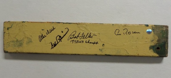 This very old wooden seat slat from Cleveland Indians Stadium is still in VG shape, completely intact, and measuring about 3x1.  It comes hand-signed in black sharpie by 4 key members to the '48 World Champion team, including Bob Feller, Al Rosen, Eddie Robinson and Allie Clark.  AWESOME looking piece, a true one of a kind, and retail is low thousands!