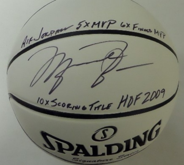 This Signature Series basketball from Spalding is an ALL white panel ball, and comes hand-signed in black sharpie by the great Michael Jordan.  Signature grades a strong 9, and includes the following inscriptions:  Air Jordan, 5X MVP, 6X Finals MVP, 10X Scoring Title and HOF 2009!  WOW!!!  What a distinctive and beautiful basketball, and retail is easily low thousands!