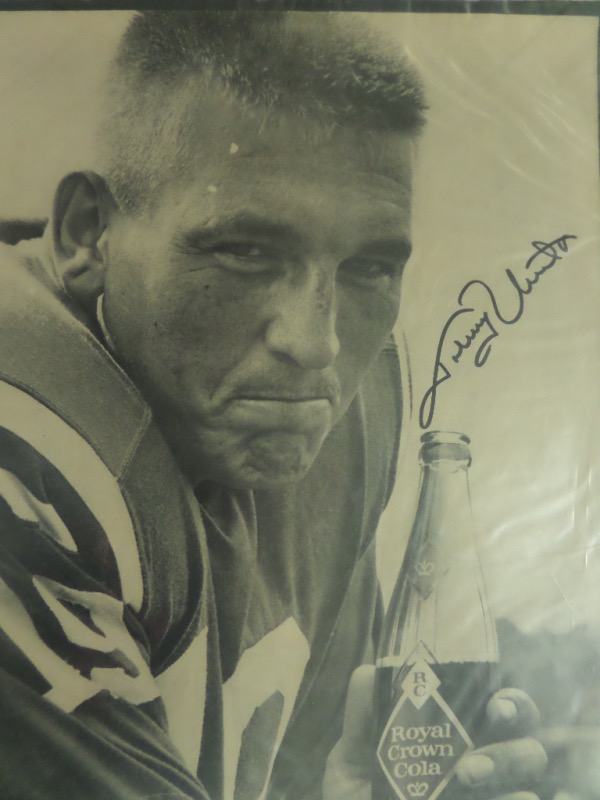 This unique collector's item is a black and white promotional 11x14 photo of Johnny Unitas, for Royal Crown Cola.  It is in EX overall condition, an ideal size for framing and display, and comes handsomely black sharpie-signed by the HOF Colts legend himself.  This is a truly flawless signature, and yes, a grade of a perfect 10 is in order, and with Unitas' death now 20 years ago, this photo is easily valued into the mid/high hundreds!