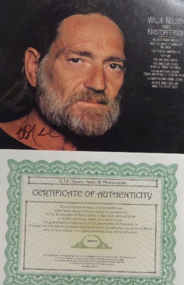 This 1979 Willie Nelson sings Kristofferson album is still in EX/MT shape, and comes front cover-signed in black sharpie by the country music legend himself.  The signature grades an overall 7, and comes certified by GTE Sports Stars & Memorabilia.  An outstanding addition to any music collection, and retail is mid hundreds!