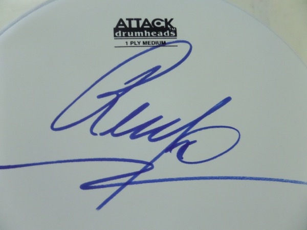 This mint 10 inch Attack Drum head is white, comes blue sharpie signed by the former Beatle and grades a 10 all day long. Terrific show off item, a musical must have, and perfect in every way. We have a bunch for sale in the back section of this auction as well. He is now impossible, so if your a fan, act quickly!