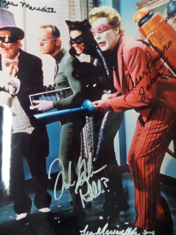 This 1967 era color 8x10 shows the Joker, Riddler, Penguin & Catwoman creating havoc on Gotham City, and comes hand signed by all FOUR deceased Hollywood stars. Yep, Caesar Romero, Frank Gorshin, Lee Meriwether and Burgess Meredith have all signed perfectly, and value is a grand for sure. Impossible to find, and a must have for all baby boomers. 