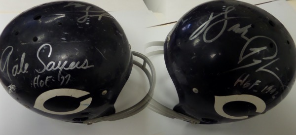 This old school, suspension-style Chicago Bears replica football helmet is still in G+/VG shape, and will show off beautifully upon display.  It is silver sharpie-signed by the Bears' two HOF, legendary running backs, Gale Sayers and Walter Payton, and with both all time greats now deceased, retail on this collector's gem is high hundreds!