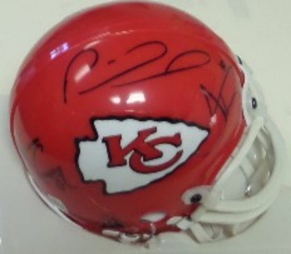 This red Kansas City Chiefs mini from Riddell is boxed in NM condition, and comes black sharpie-signed by three key members from the the Super Bowl LIIII Champion team.  Included, all on the same side for display, are Patrick Mahomes, Tyreke Hill and Travis Kelce, with all signatures grading 8's or better, and this helmet is valued into the high hundreds!