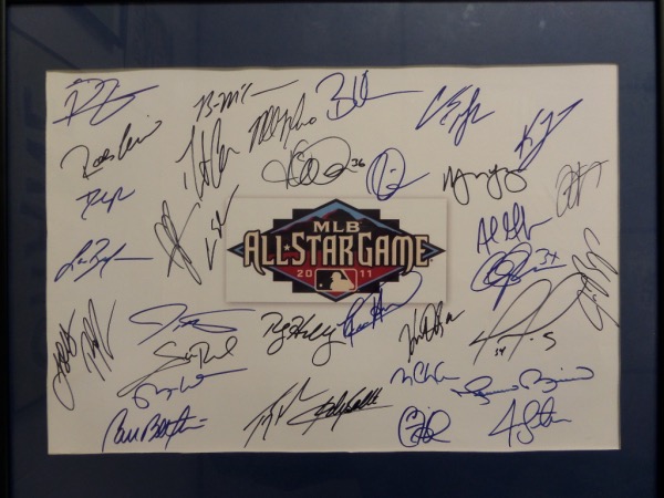 This awesome, custom matted and framed poster is 16x20 in size, and comes black and blue sharpie signed by MANY! I can make out Roy Halladay, David Ortiz, Clayton Kershaw, Mariano Rivera etc. and grade is a clean bold 10 everywhere. Superb man cave display piece, value is about a grand, and show off is EZ from 35 feet away!  