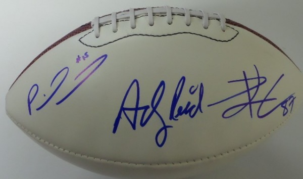 This full size, triple white panel football is in NM/MT condition overall, and comes hand-signed in blue sharpie by a trio of Chiefs who are ALL destined for Canton.  Included are Andy Reid, Patrick Mahomes and Travis Kelce, with signatures all grading 9's or better, and all residing on the same panel for optimum displayability!  Valued into the low thousands!