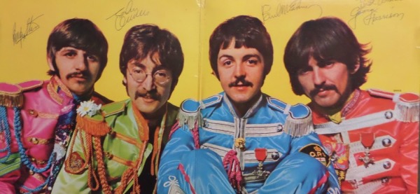 This original 1967  lp album is in EX shape and comes on the inside fold out part by all 4 in bold blue inks!! GORGEOUS autographs and perfect for display and HIGH RETAIL value.  A must for the Beatles collector and rare with Lennon and Harrison sig's.  