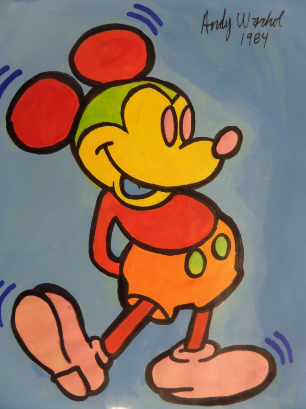 This color 8x10 is a hand-drawn, hand-painted, colorful artwork of Mickey Mouse, done by the most famed pop culture artist ever, the incomparable Andy Warhol.  He signed it in black at the top left corner, with a 1984 date added, and the piece includes a full LOA from The Joe DiMaggio Estate for certainty!