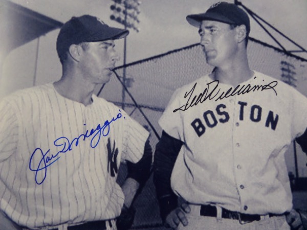 This black and white 8x10 photo shows all time greats Ted Williams and Joe DiMaggio standing together in a dugout in the early 1940's.  It is blue sharpie-signed by both HOF'ers, and comes certified by JLA Authentics.  With both men long gone, retail here is easily mid hundreds!