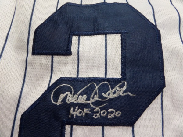 This home white, pinstriped size 44 New York Yankees jersey from Nike is in MINT condition, and comes back number-signed in silver sharpie by future HOF Yankees shortstop Derek Jeter!  Signature grades an overall 9, and includes a HOF 2020 inscription!  Awesome Yankees item, ideal for framing and display, and retail is low thousands