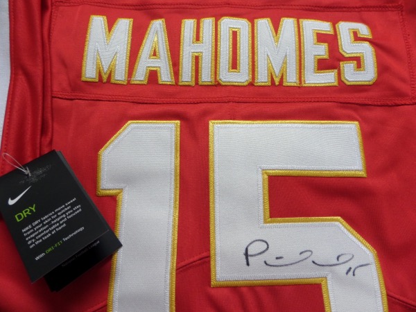 This mint authentic bright red Chiefs jersey comes signed by this future HOFer on his back numbers with his #15 included.  Chiefs are favored for another run next year after winning it AGAIN this year and this jersey shows off wonderfully and is guaranteed authentic. HIGH retail 